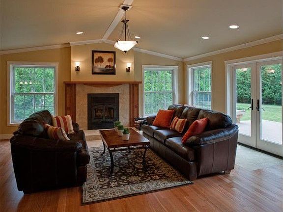 The new Anderson windows invite the outside in as you cosy up to the fireplace.