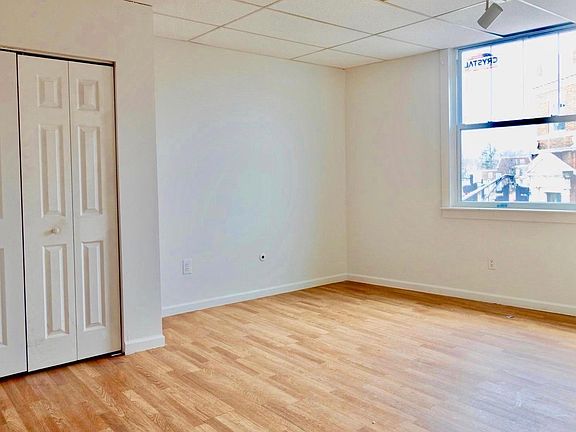 Newly renovated apartment inside the Corner Neo Classic historical mid-century Building , new double paned glass windows, newly painted, new floor.