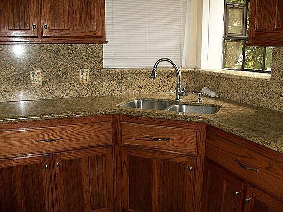 Updated kitchen cabinetry and granite counter tops