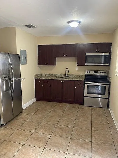 Building Photo - 3031 NW 134th St #3