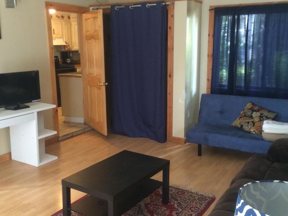 Back seating area with access to porch. (Usually used as a bedroom due to small size of bedroom 4.