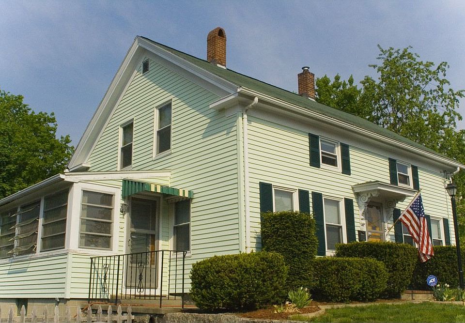 Front of the house and the sunroom on the left
