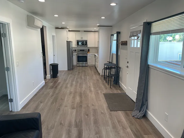 Spacious living room and kitchen combo.