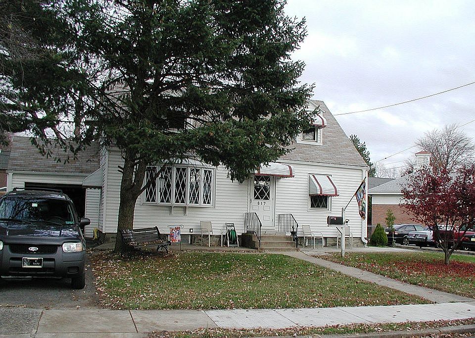 Exterior Front - private driveway with garage
