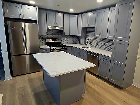 Brand New Gourmet Kitchen with Stainless Steel Appliance Package