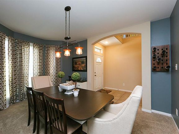 What a great place to entertain. Love the bay window!