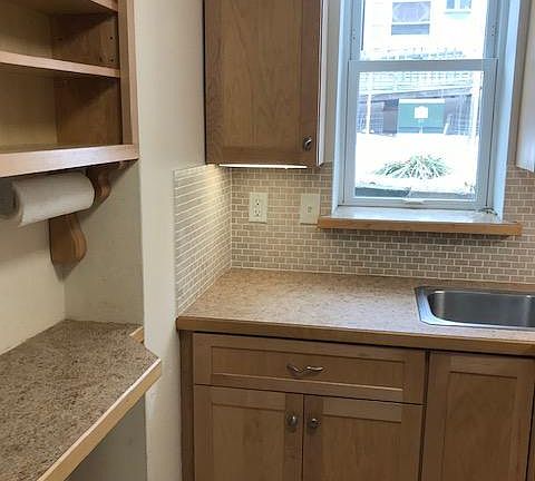 Added open shelves and counter multiple uses