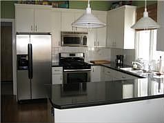 Cook's kitchen with lots of cabinet and counterspace