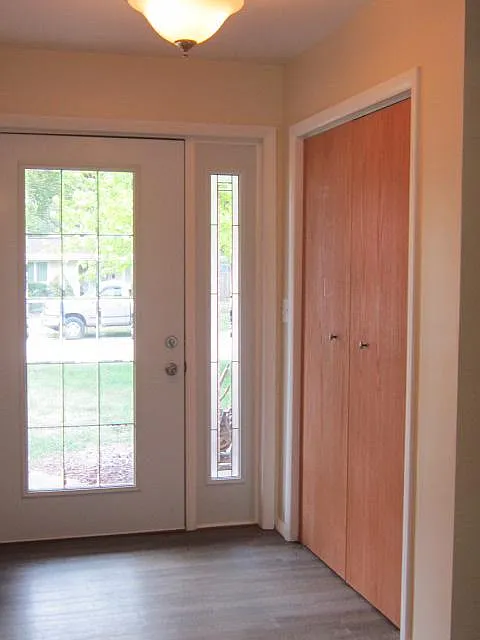 New front door and big entry closet. - 901 Snyder Dr