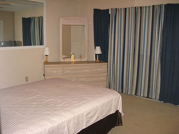 Sliding door in bedroom with deck