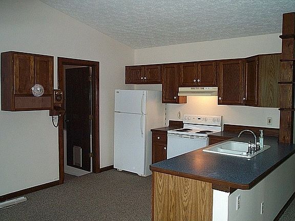 Your first steps into the "Great Room" floor plan view the kitchen.  