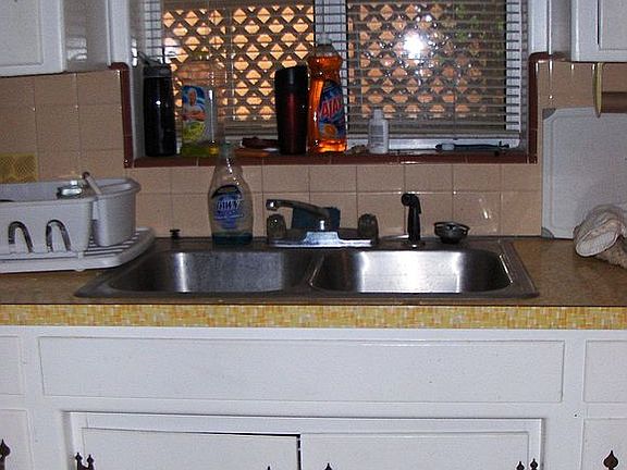 Kitchen with cook top and wall oven