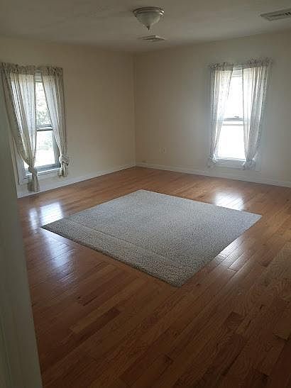 Living room with hardwood floor
