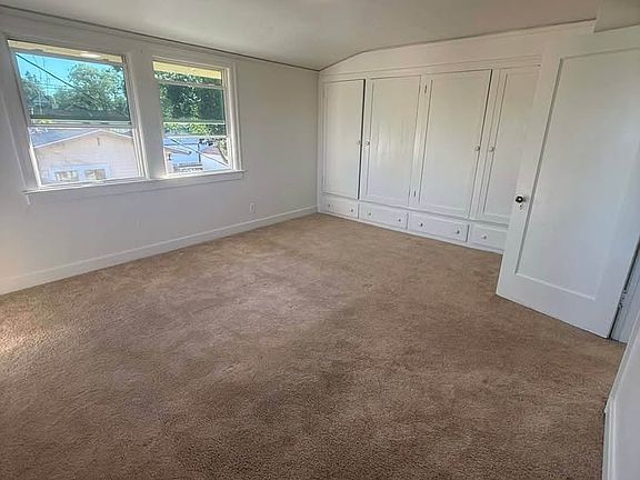 Spacious room with his/her closet