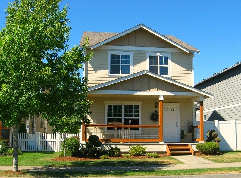 another view of spacious beautiful home! notice extra tall privacy fencing to right as well