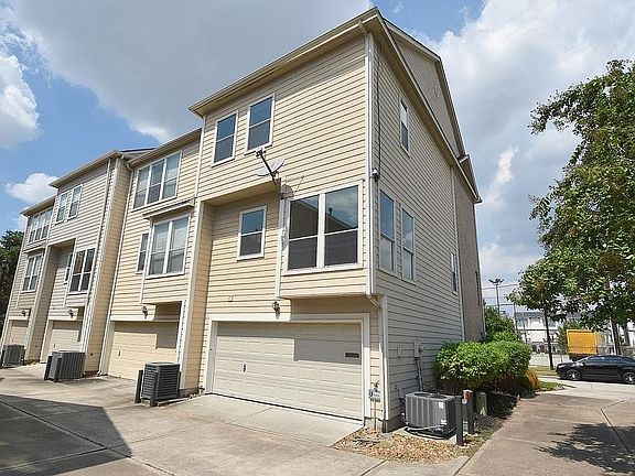 View of 2 car garage & plenty street parking