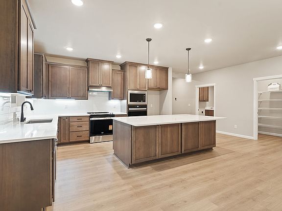 709 N Thrush CT by Aho Construction