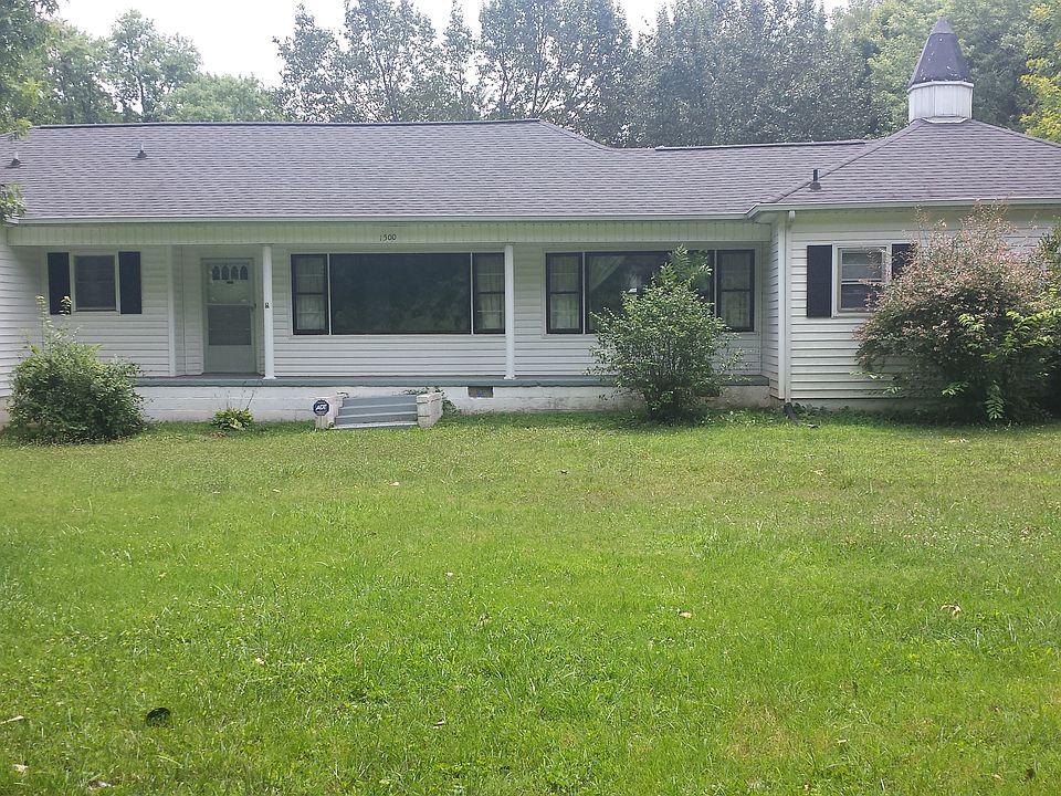 front of home facing cedar l