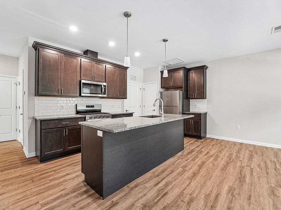 Tower Ridge Grande Hawthorne Kitchen Center Island Stainless Steel Applicances Granite Countertops