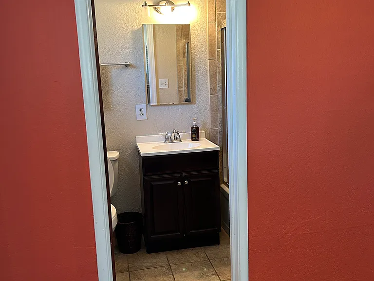 Entrance to private ensuite bathroom.