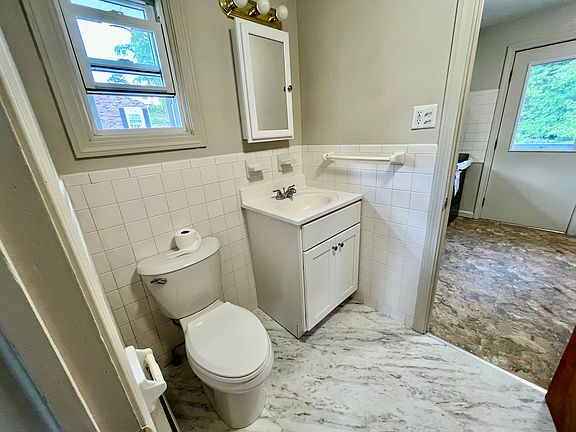 Bath has a walk through option. You can enter from both the bedroom and the kitchen.