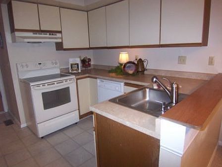 Remodeled Kitchen with New Counters, New Flooring, Newer Appliances