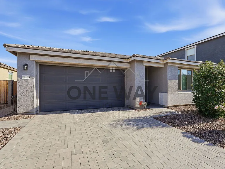 11253 E Ulysses Ave — Photo 1