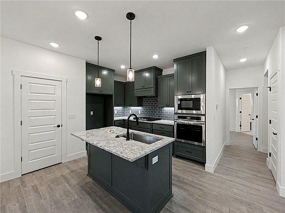 5th image of 6906 High Meadows Ave