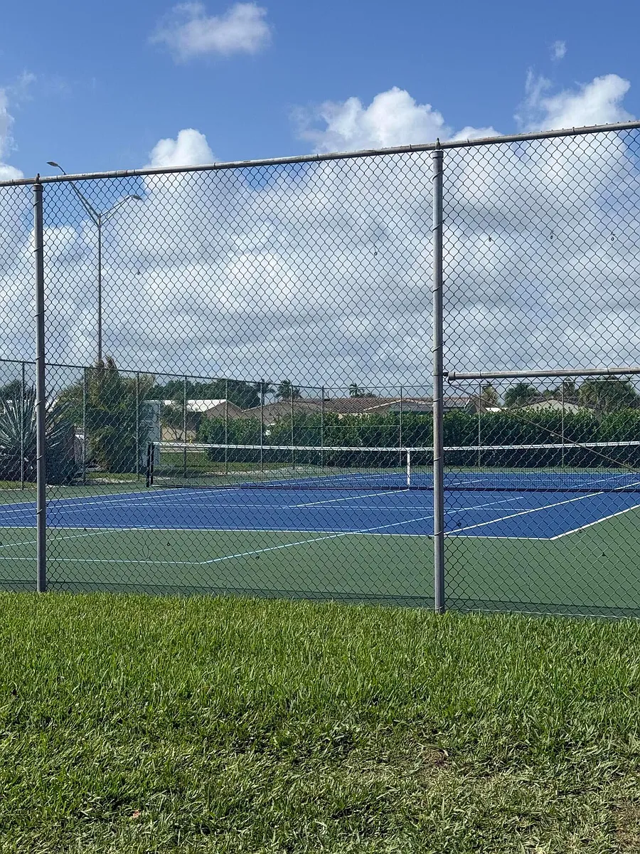 Building Photo - 6670 Royal Palm Blvd #205K
