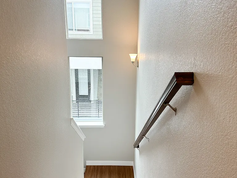 Beautiful Stairway looking down from Bedroom Level
