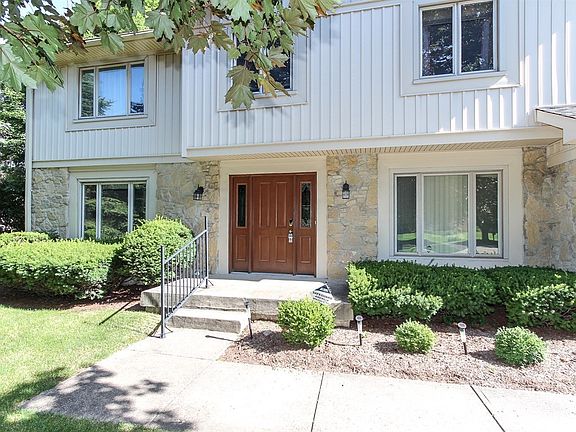 newer front door and nice landscaping...original owner of 37 years would love to stay here forever!