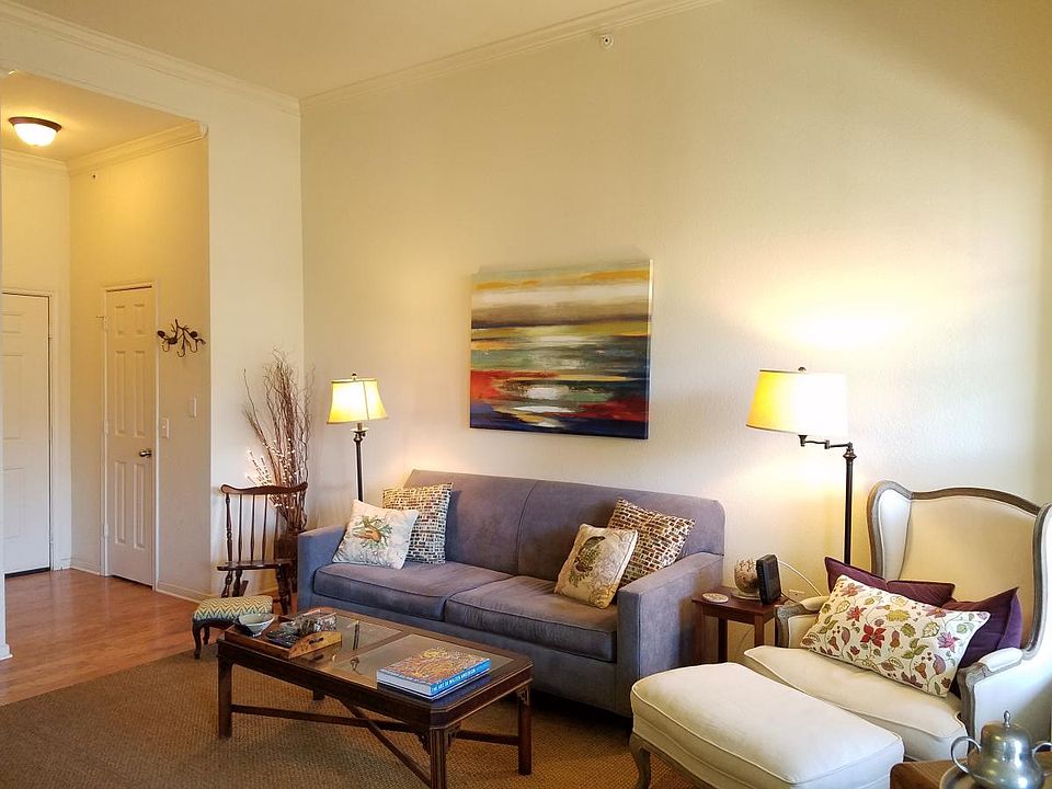 living room; front door on left hand side of photo.