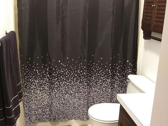 Bathroom with new d_cor and towels.