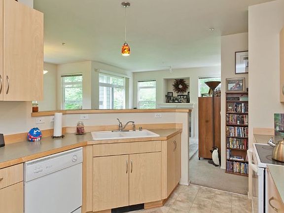 Kitchen w/ Cabinets & Walk-in Pantry