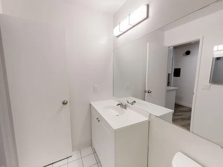 3327 Livonia Ave — Photo 18