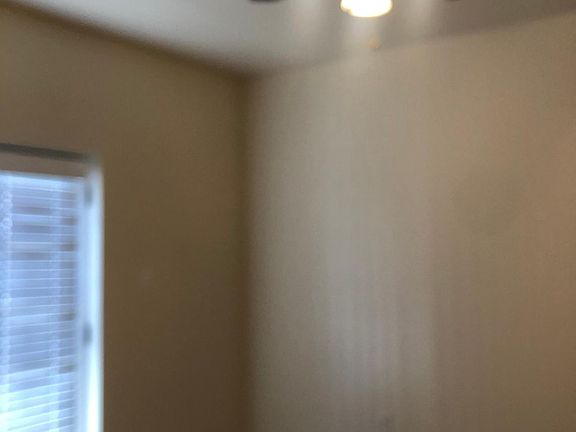 Large front bedroom off of balcony with closet