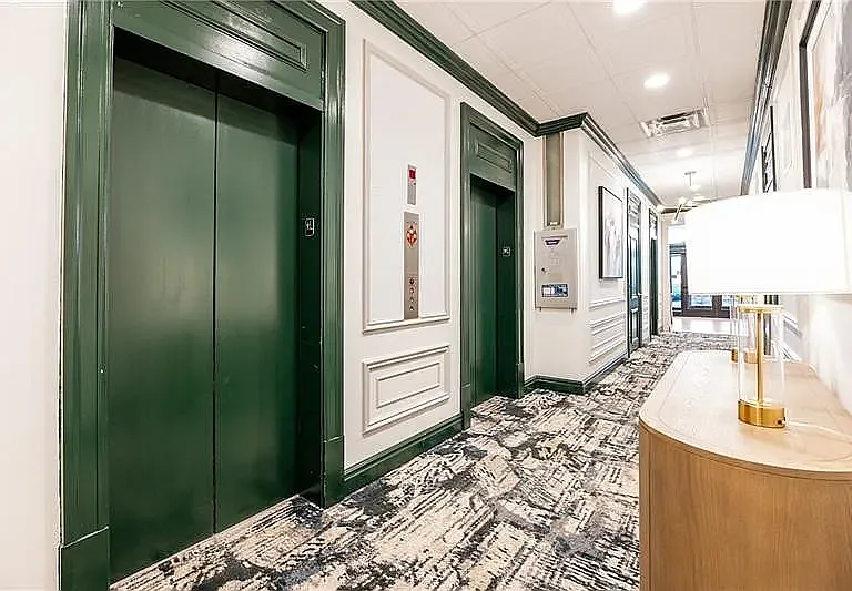 Lobby and elevators. Building provides doorman service, security camera service, and a secure package room.