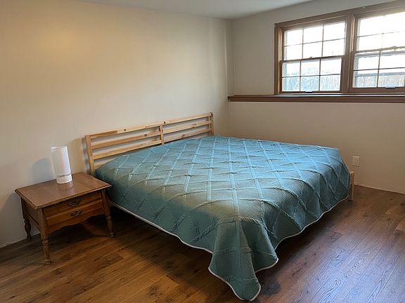 Large bedroom (fits king bed as shown). Two closets. Plenty of room for dressers.