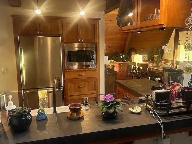 Beautifully appointed kitchen, custom cabinetry and counters.