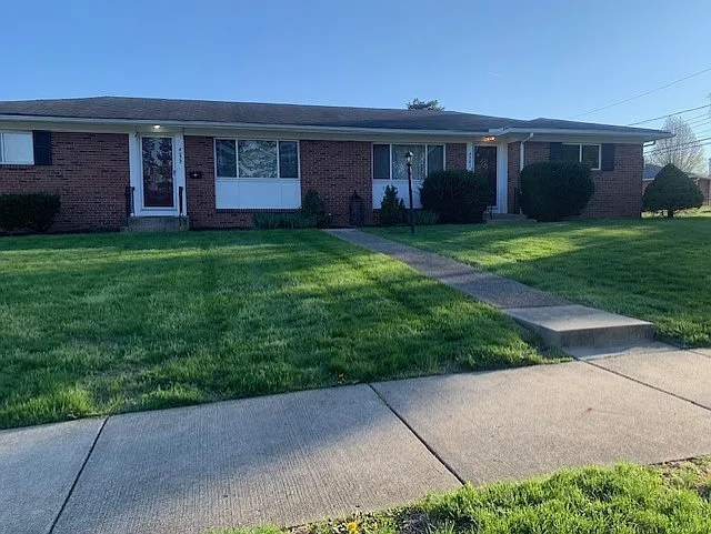 Front view with nice big yard