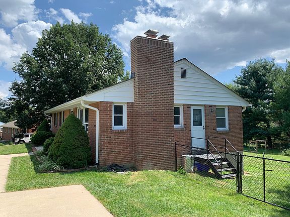 Fenced in backyard, with convenient side door to kitchen. New chimney liner recently installed.