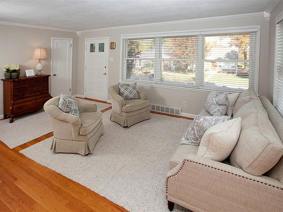 Gorgeous wood floors and walls of windows.