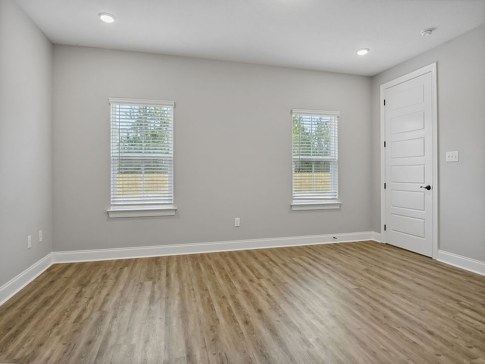 Primary bedroom in the Taylor floorplan at a Meritage Homes community in Gulfport, MS.