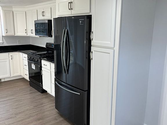Kitchen with built in fridge