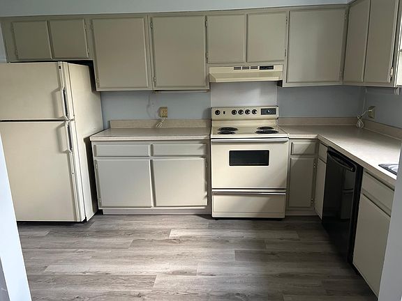 Lovely kitchen is freshly painted with new flooring and dishwasher. Loads of cupboards.