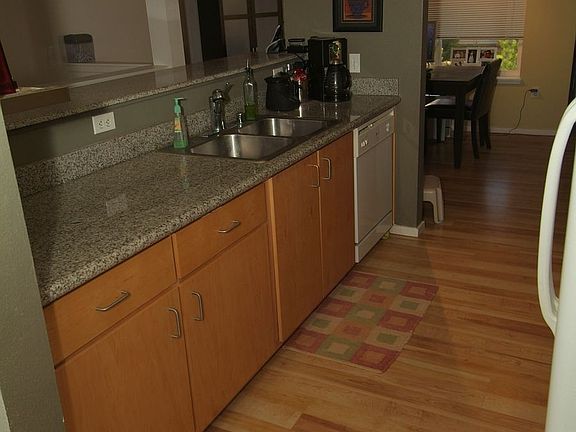Kitchen from hall by bedrooms