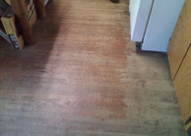 wood laminate floor over original vinyl