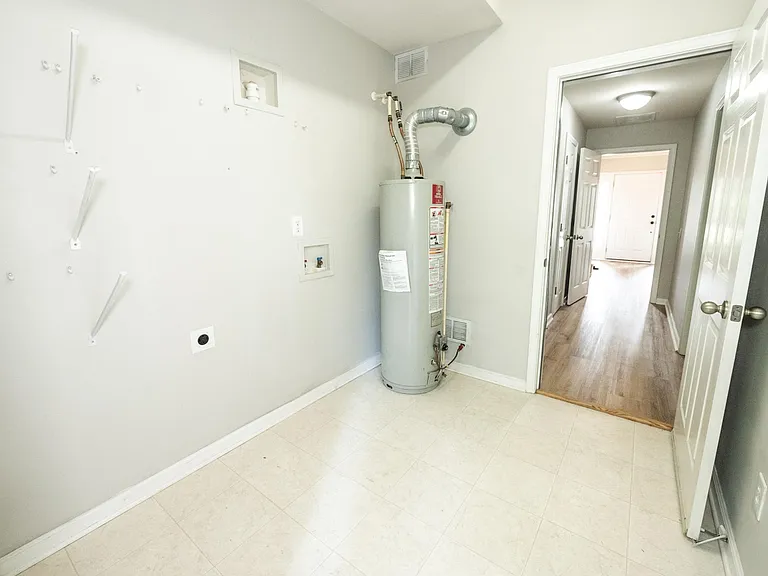 Full walk in laundry and storage room. Plenty of room to act as a linen storage area as well.