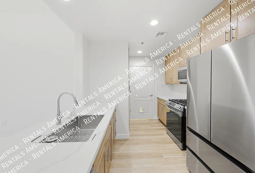Upgraded 4th Floor Condo at Tapestry on Central 2 Bed + Studio — Photo 4