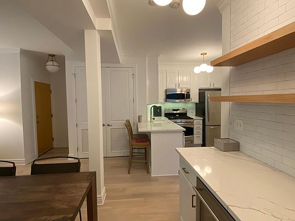 kitchen and dry bar/ dining area